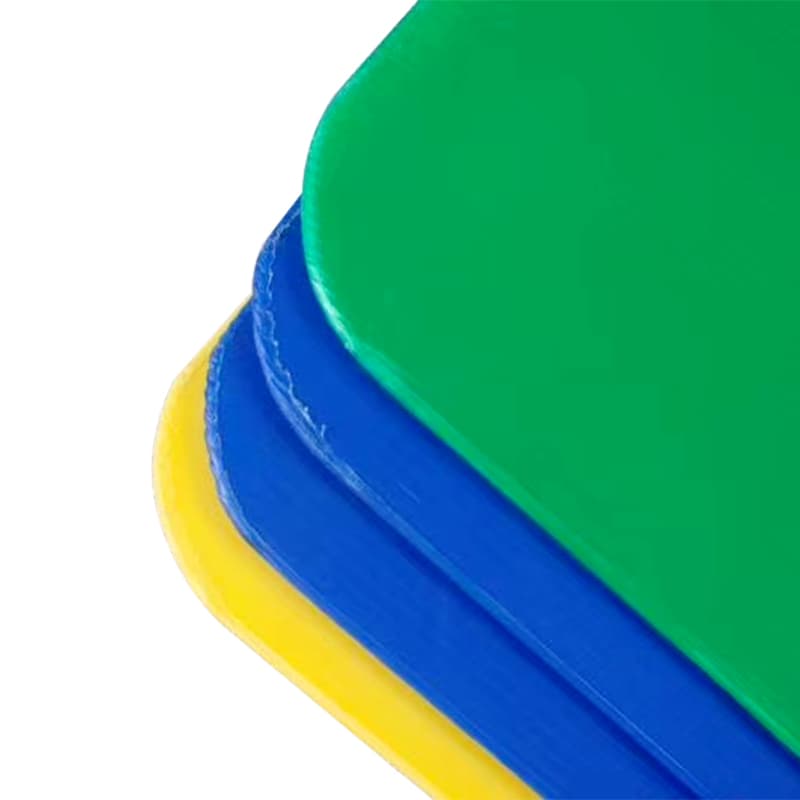 Green, blue and yellow rounded PP bottle layer pads stacked on white