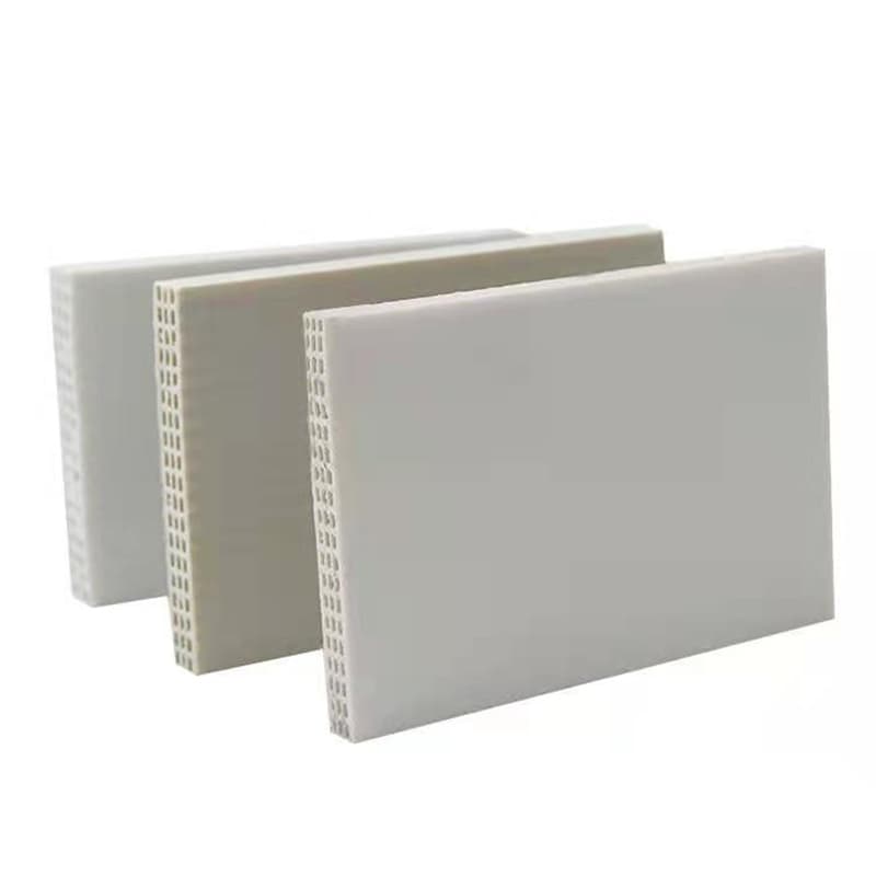 Three white PP hollow plastic formwork panels standing on a clean white background